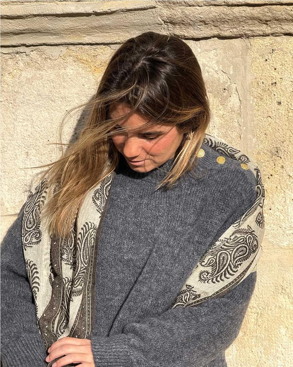 Jersey mohair con botones laterales...