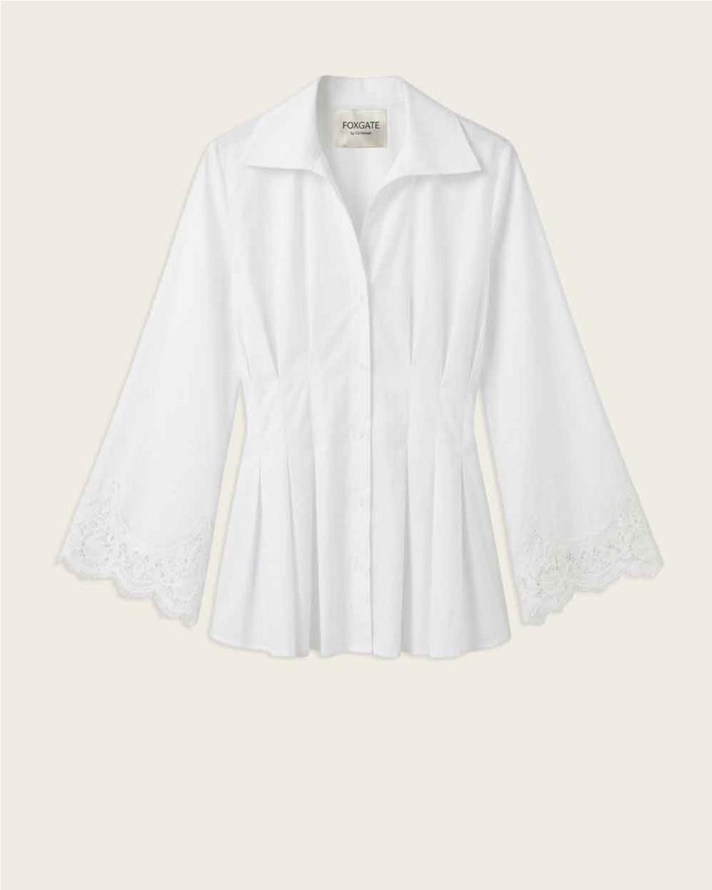 Camisa blanca de algodón con puño...